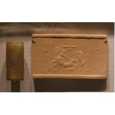 Darius seal, firing arrows at a lion, winged sun-disc